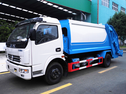 Dongfeng Camión compactador de basura de 8 metros cúbicos